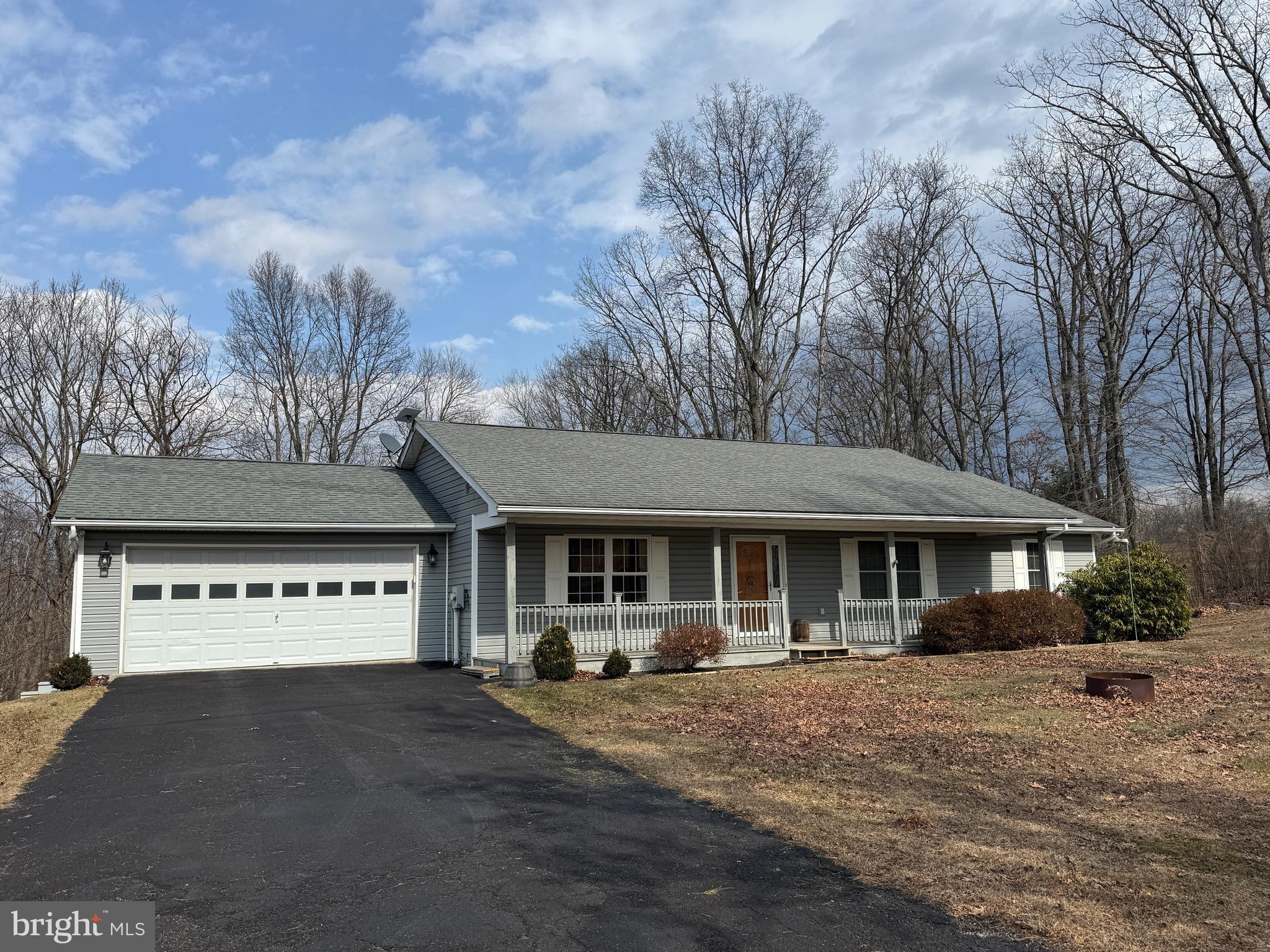 2559 Hickory Corner Road Augusta, WV 26704 - Photo 1 of 1 a view of a large building with a large tree