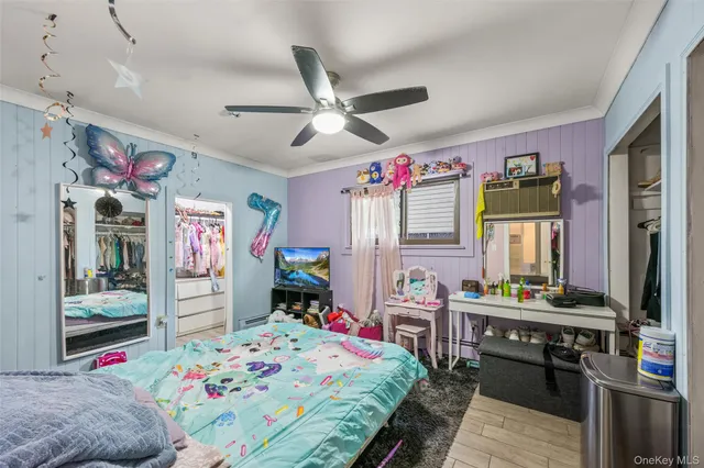 a bedroom with furniture a bed and a window