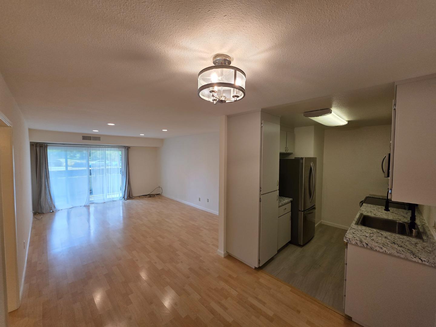 309 Tradewinds Drive, Unit 3 San Jose, CA 95123 - Photo 11 of 34 a view of an empty room with a window