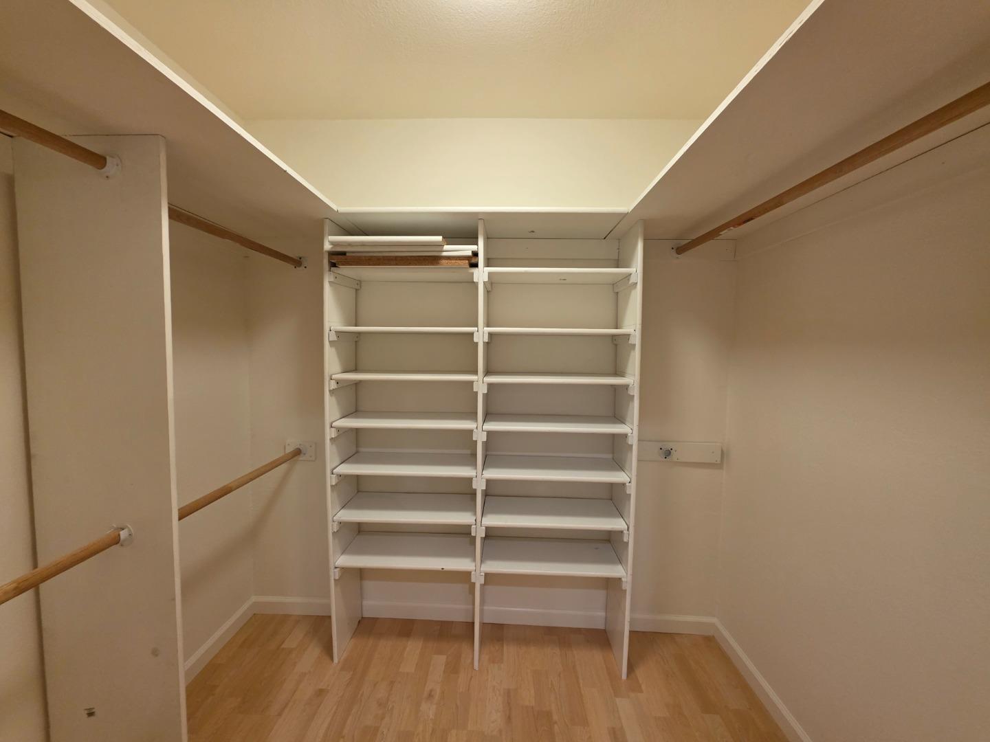 309 Tradewinds Drive, Unit 3 San Jose, CA 95123 - Photo 18 of 34 a view of walk in closet with empty racks