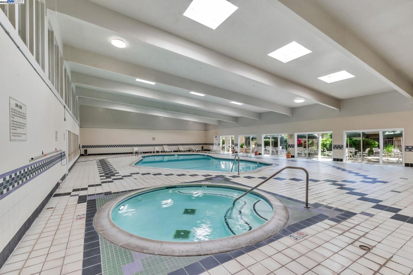 309 Tradewinds Drive, Unit 3 San Jose, CA 95123 - Photo 31 of 34 a room with a table and chairs