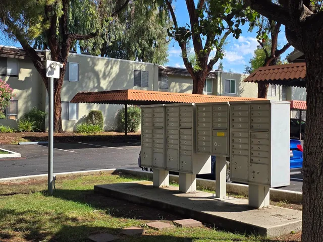 a view of a chairs and table in the patio
