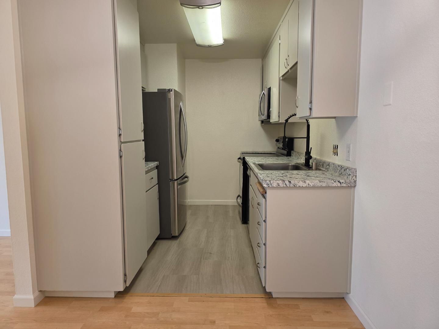 309 Tradewinds Drive, Unit 3 San Jose, CA 95123 - Photo 10 of 34 a room with storage and utility