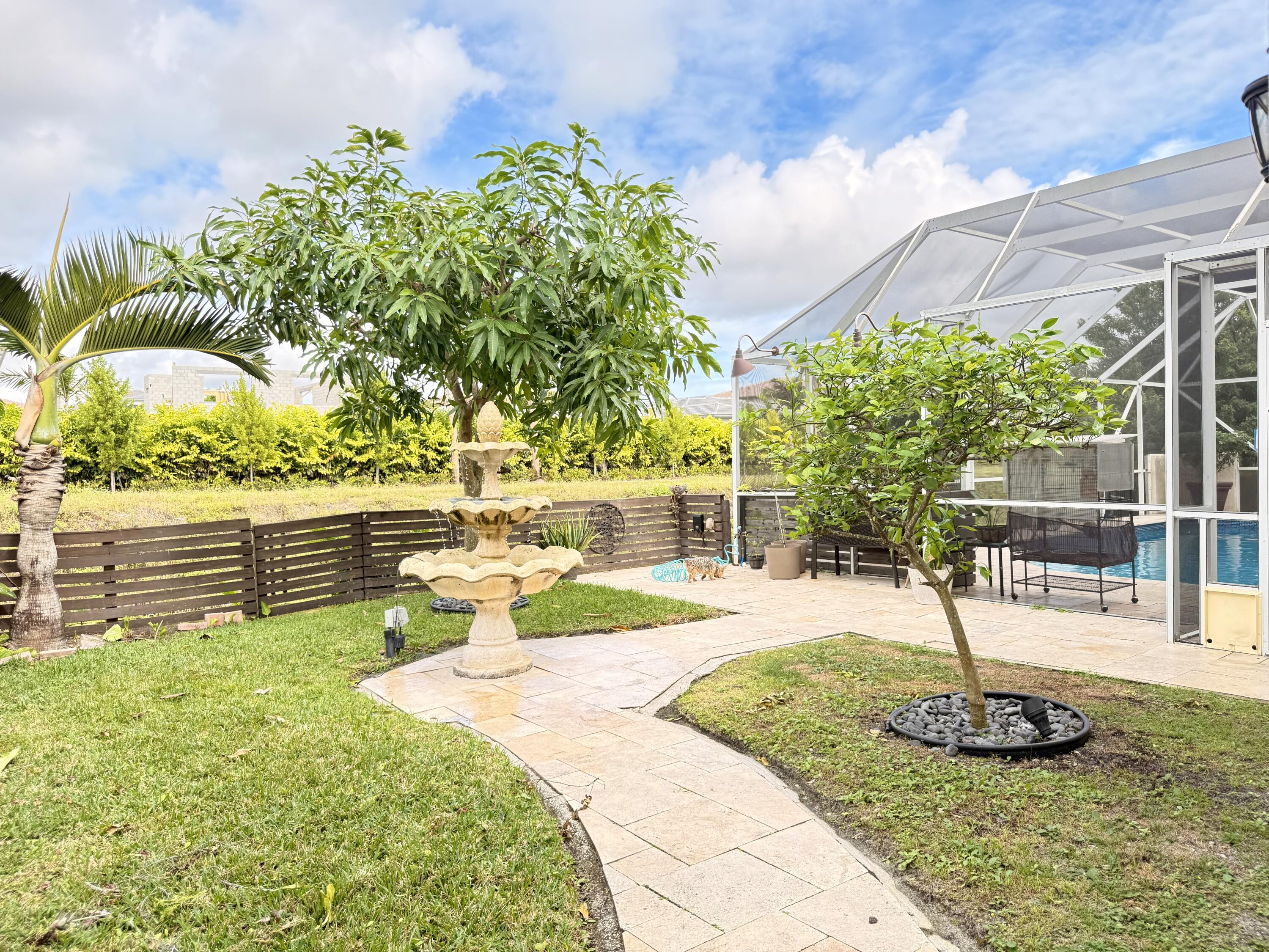 9669 Carousel Circle North Boca Raton, FL 33434 - Photo 40 of 76 Backyard & Canal View