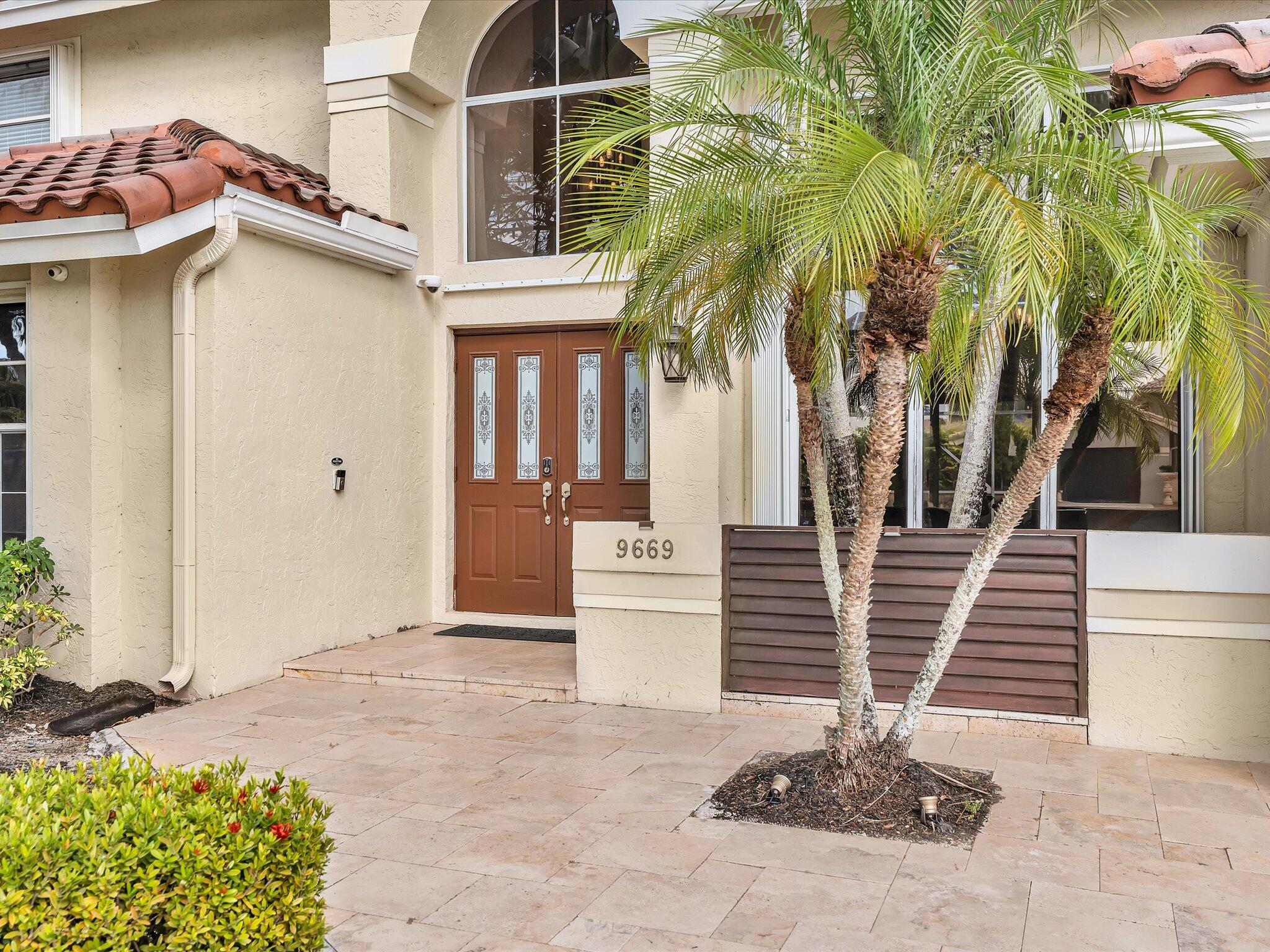 9669 Carousel Circle North Boca Raton, FL 33434 - Photo 5 of 76 Front Entry