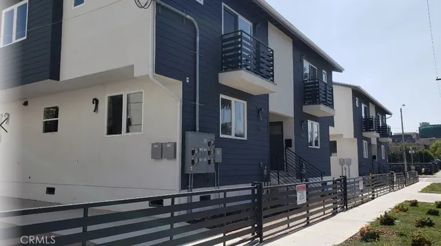 a front view of a house with street