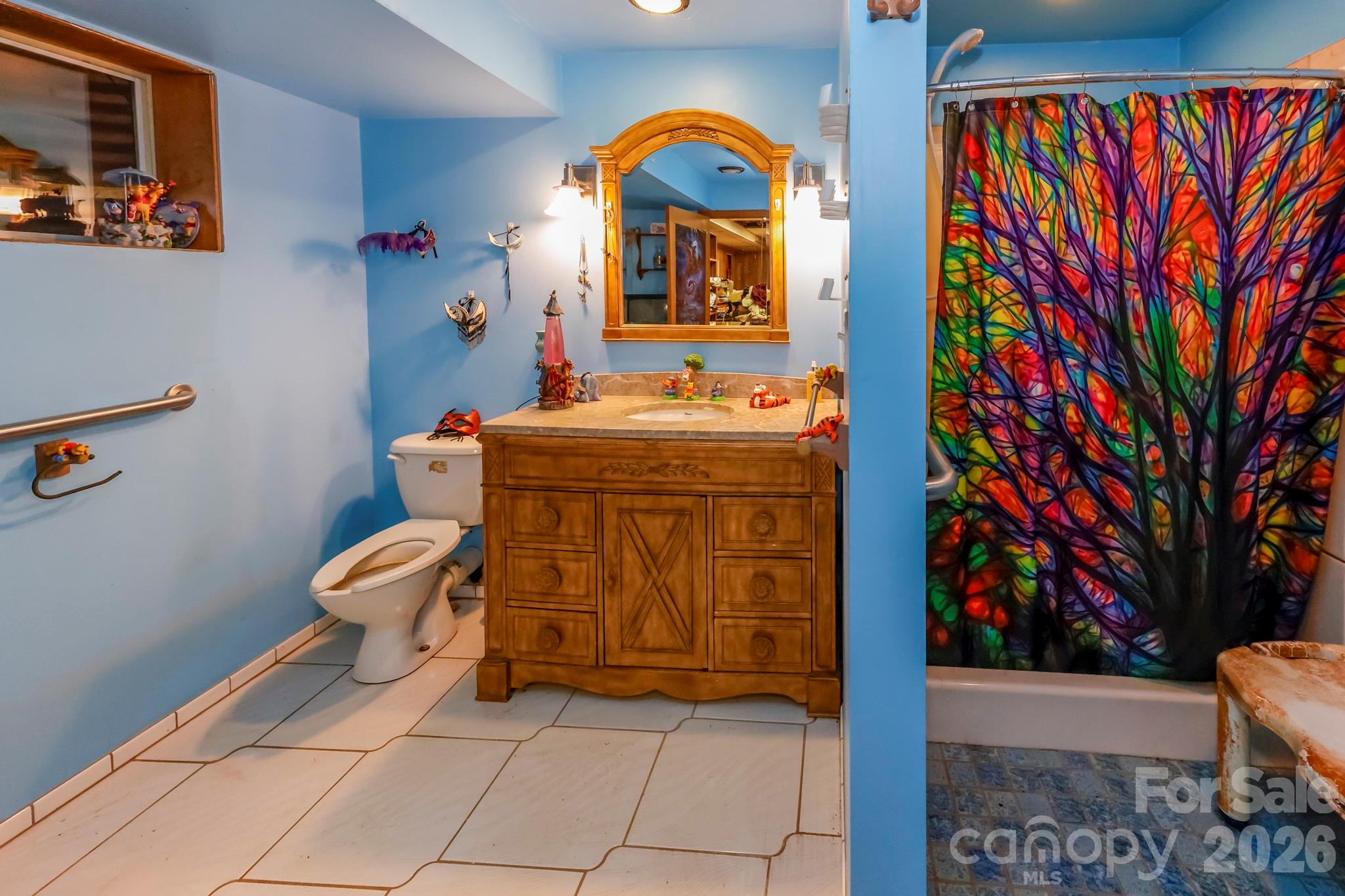 350 Morningstar Lake Road Forest City, NC 28043 - Photo 23 of 27 a room with a table and a mirror