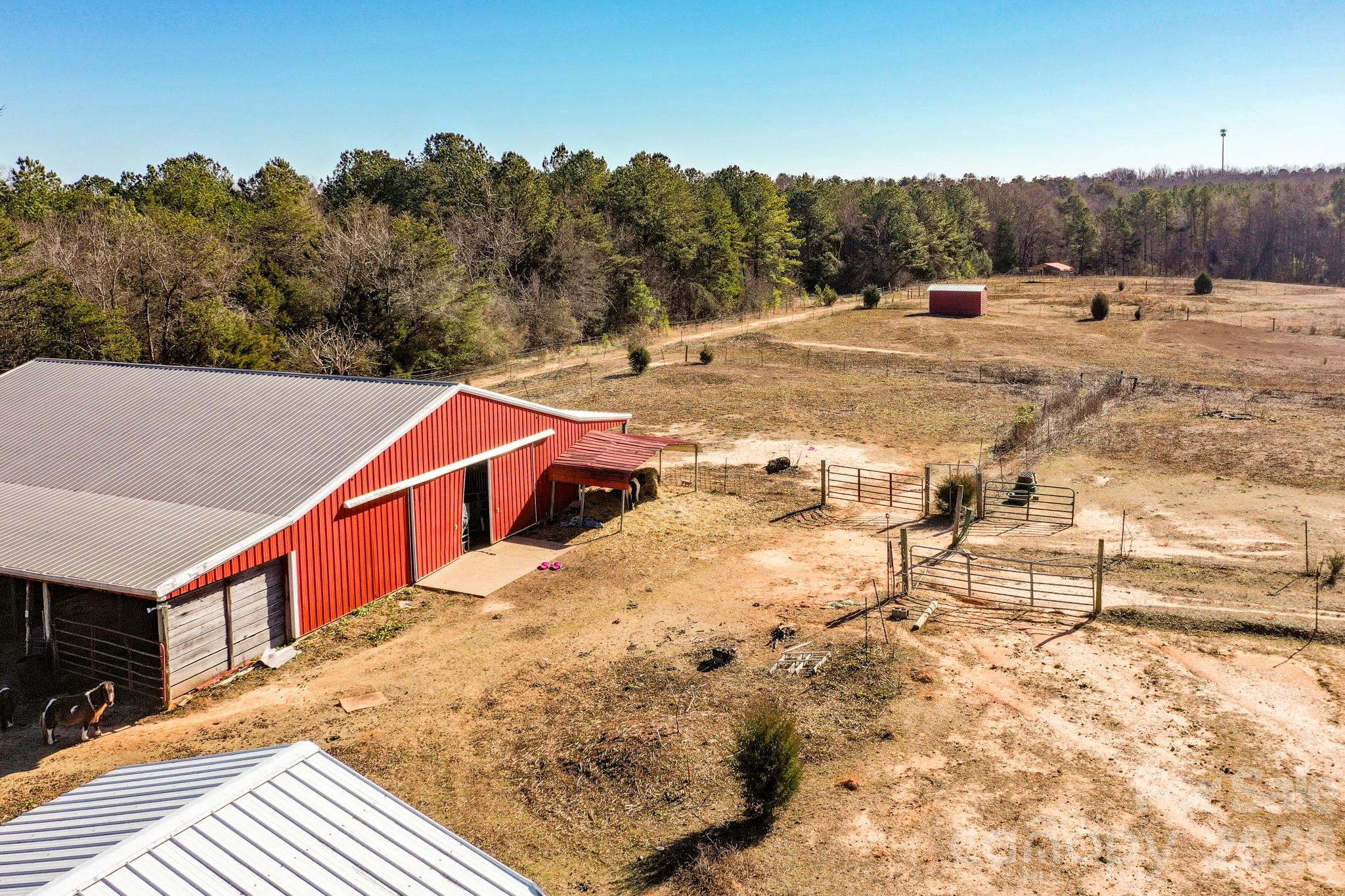 350 Morningstar Lake Road Forest City, NC 28043 - Photo 24 of 27 a view of a terrace with a outdoor space