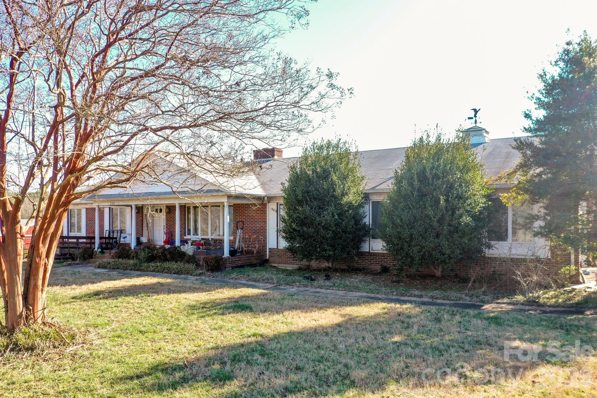 350 Morningstar Lake Road Forest City, NC 28043 - Photo 3 of 27 a view of a house with swimming pool and a yard