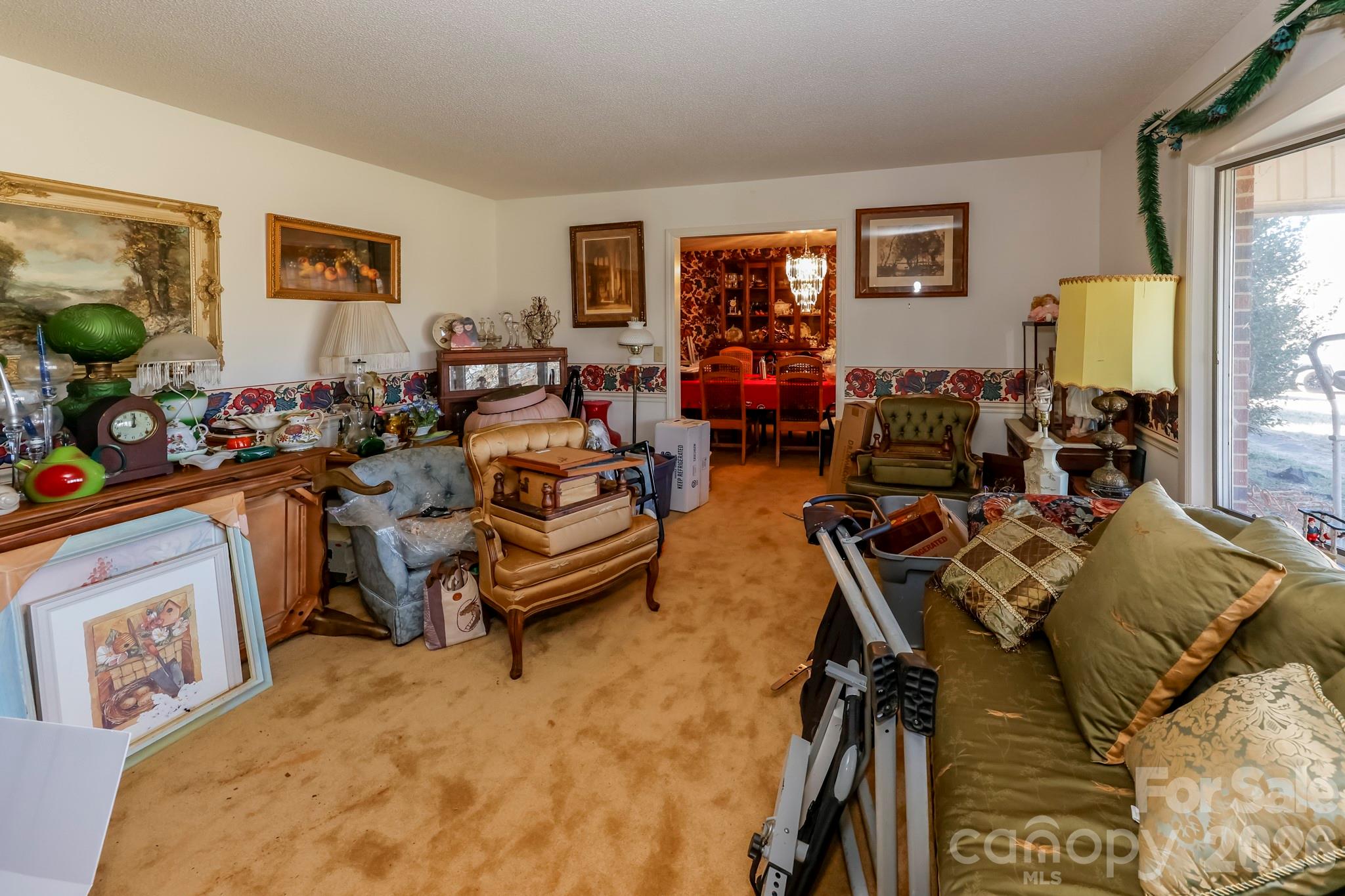 350 Morningstar Lake Road Forest City, NC 28043 - Photo 5 of 27 a view of a livingroom with furniture and a flat screen tv