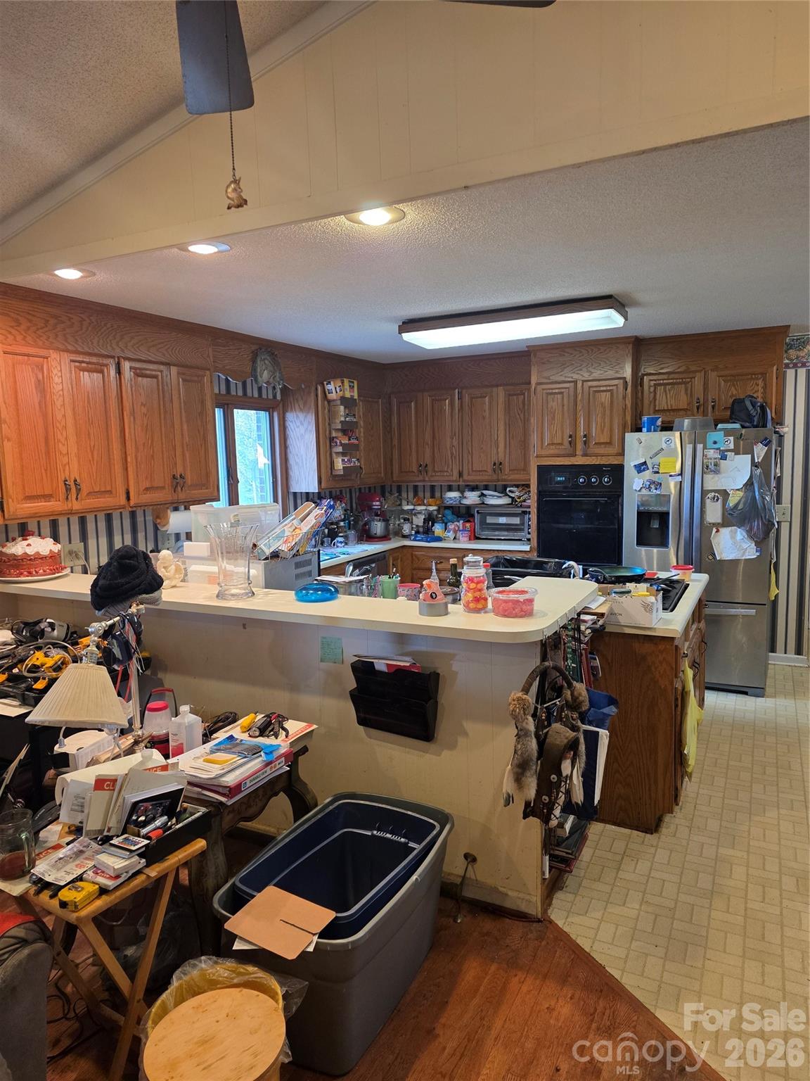350 Morningstar Lake Road Forest City, NC 28043 - Photo 10 of 29 a kitchen with a table chairs stove and kitchen view