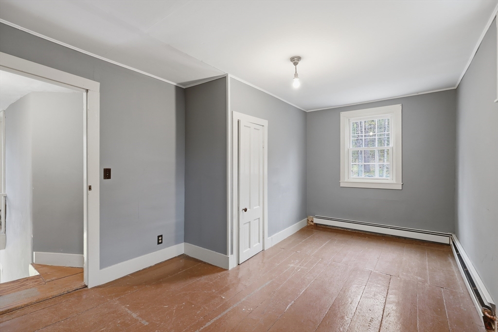 5 Gap Mountain Road Fitzwilliam, NH 03447 - Photo 14 of 31 wooden floor in an empty room with a window