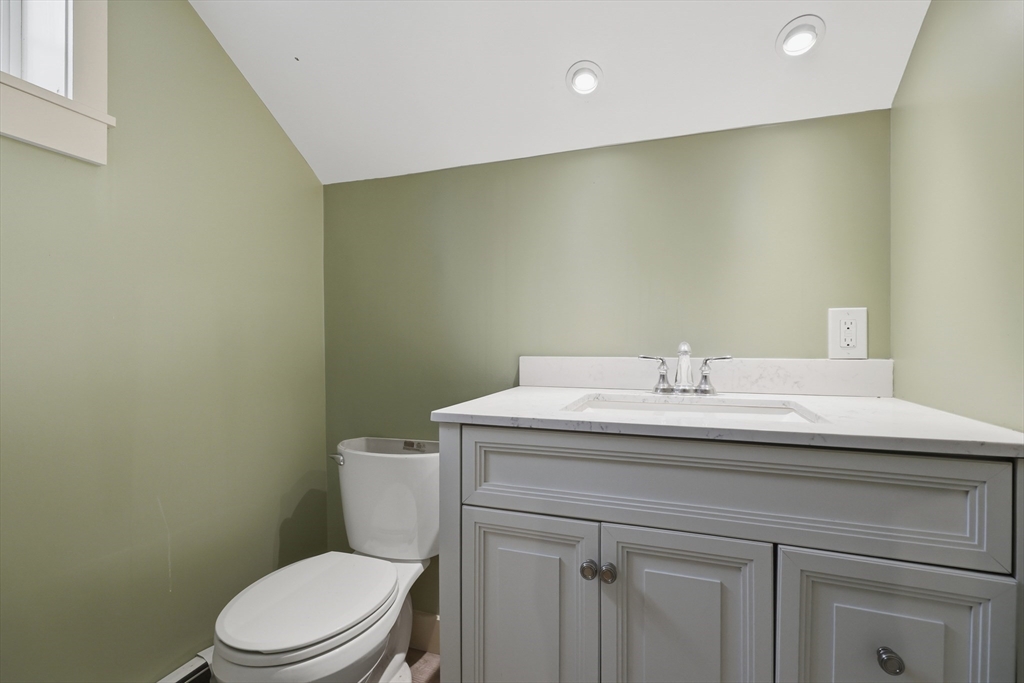 5 Gap Mountain Road Fitzwilliam, NH 03447 - Photo 18 of 31 a bathroom with a sink a toilet and mirror