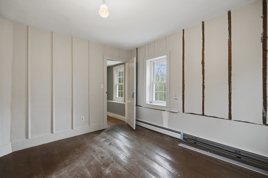 5 Gap Mountain Road Fitzwilliam, NH 03447 - Photo 20 of 31 a view of an empty room with window