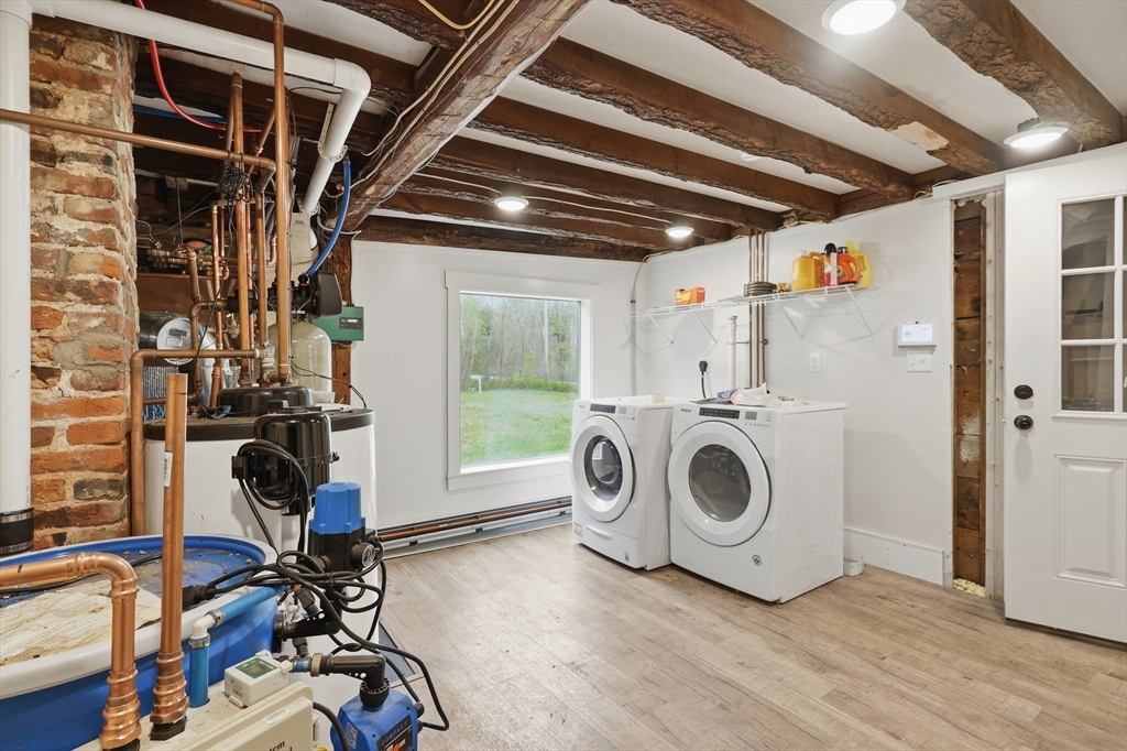 5 Gap Mountain Road Fitzwilliam, NH 03447 - Photo 21 of 31 a view of a storage & utility room with washer and dryer