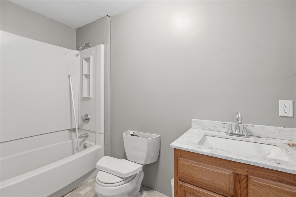 5 Gap Mountain Road Fitzwilliam, NH 03447 - Photo 7 of 31 a bathroom with a granite countertop sink toilet and shower