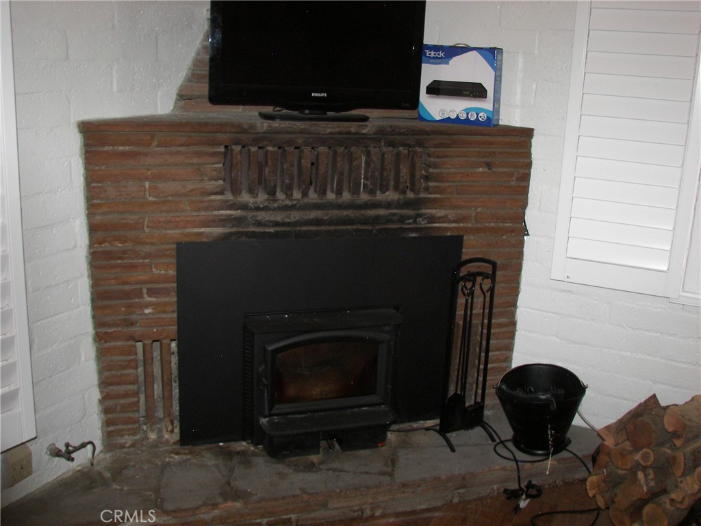 1101 Big Tree Lane Crestline, CA 92325 - Photo 12 of 30 a close view of a fireplace
