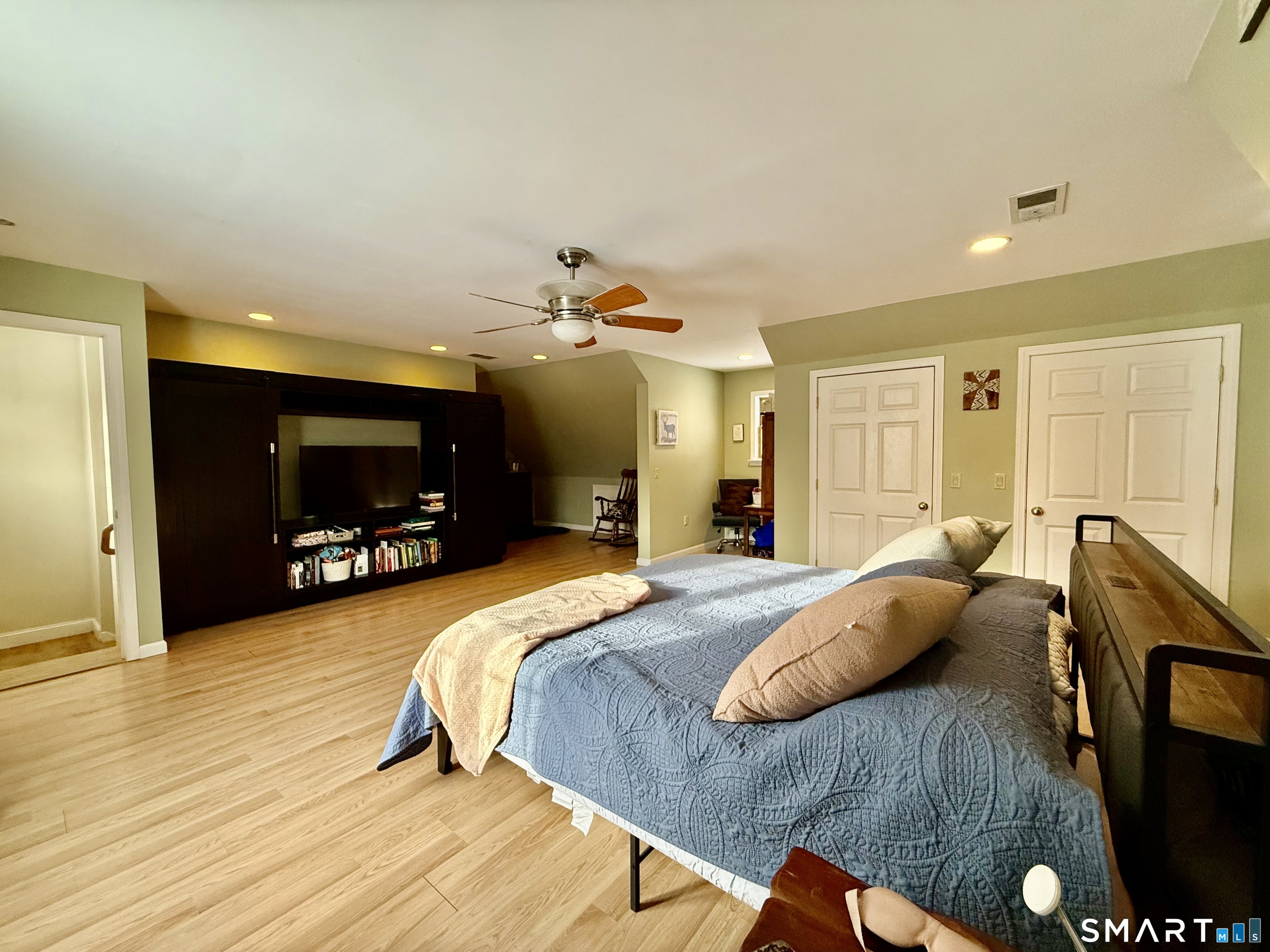 1425 Exeter Road Lebanon, CT 06249 - Photo 12 of 28 a bed room with a bed and a television