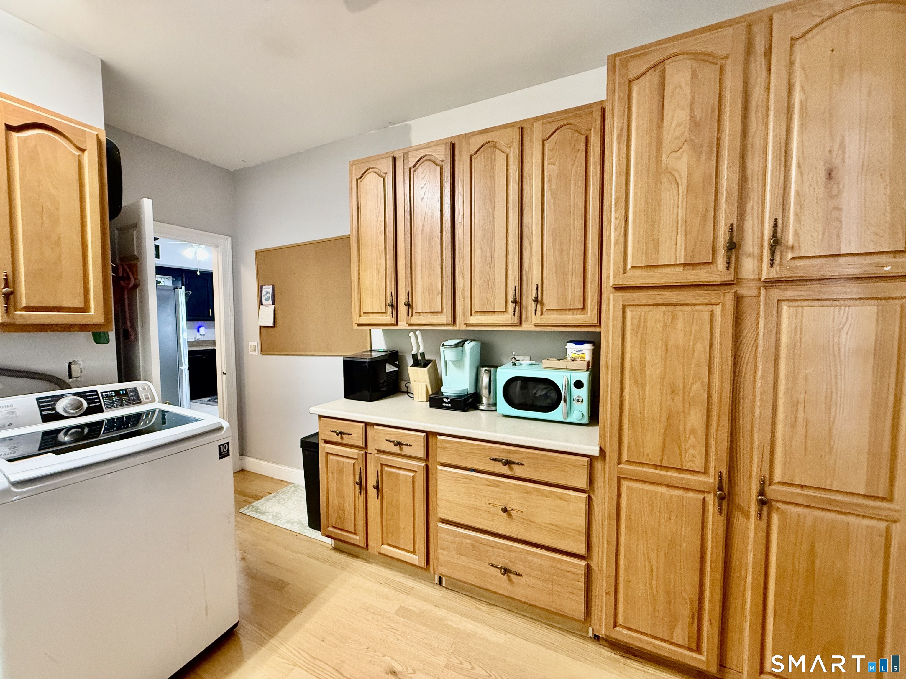 1425 Exeter Road Lebanon, CT 06249 - Photo 18 of 28 a kitchen with stainless steel appliances a refrigerator sink and cabinets