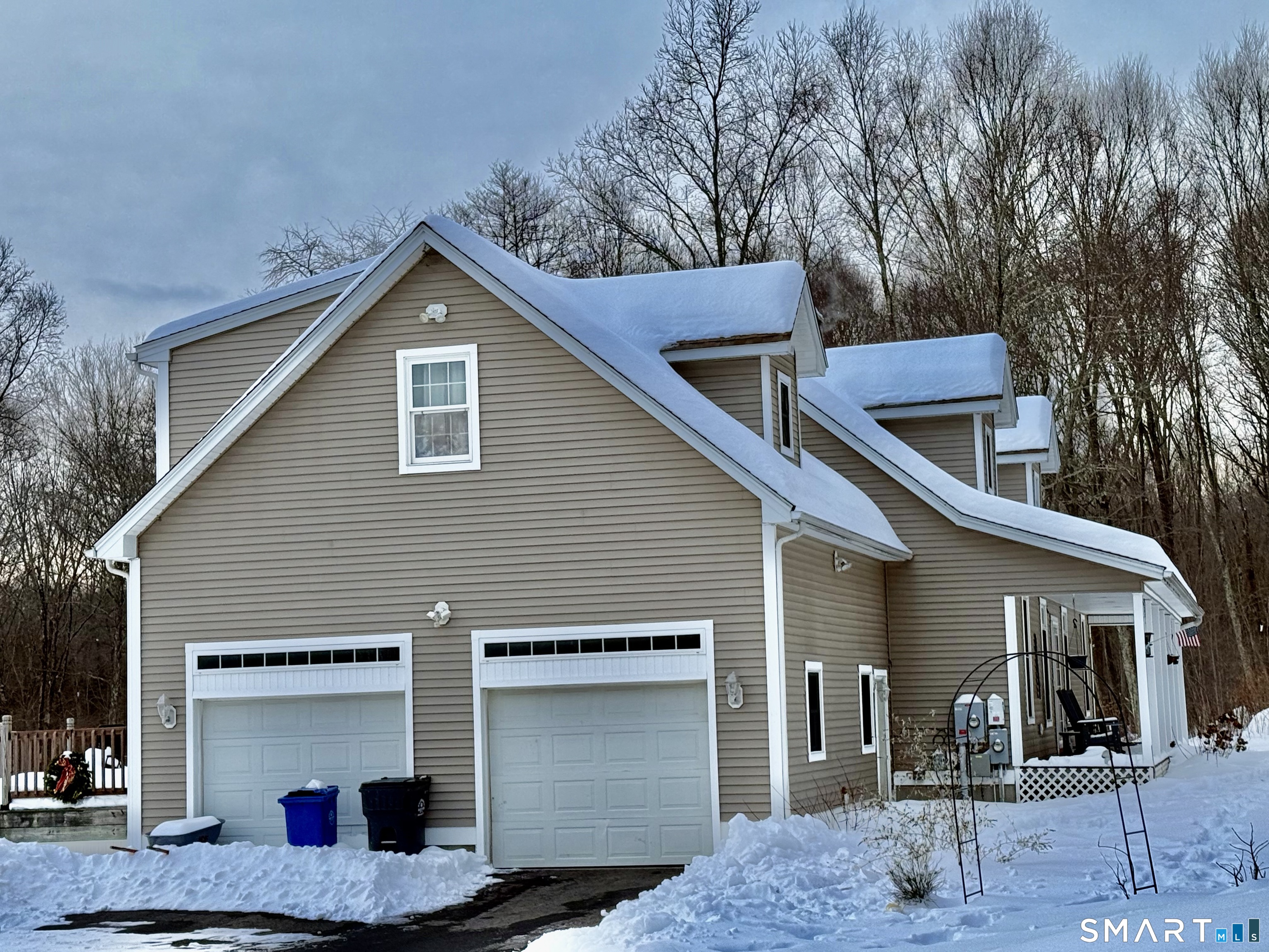 1425 Exeter Road Lebanon, CT 06249 - Photo 2 of 28 a front view of a house with garage
