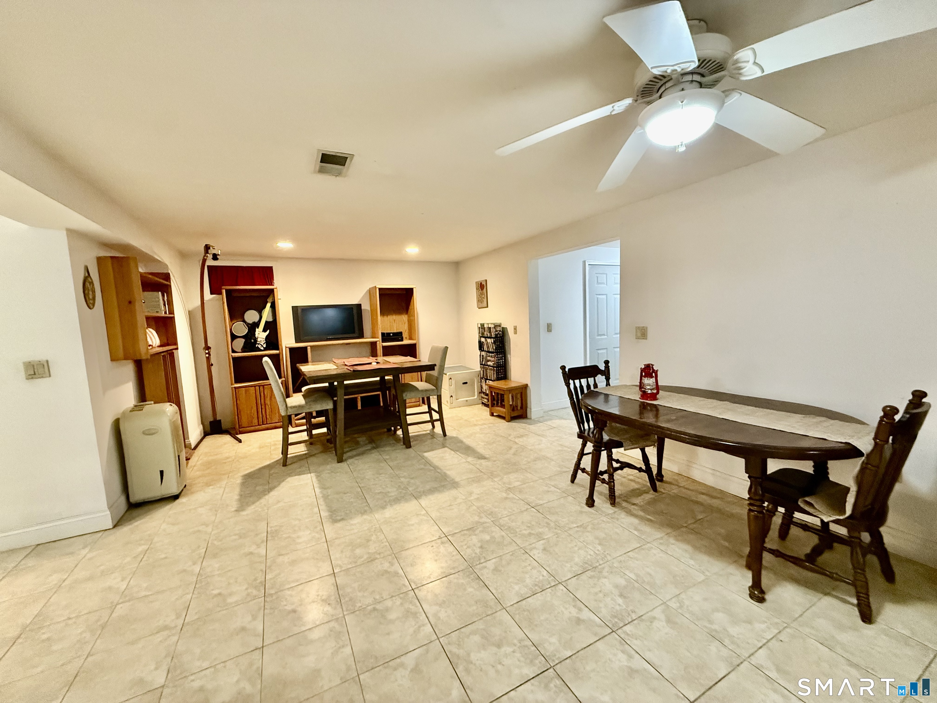 1425 Exeter Road Lebanon, CT 06249 - Photo 21 of 28 a living room with furniture and a flat screen tv
