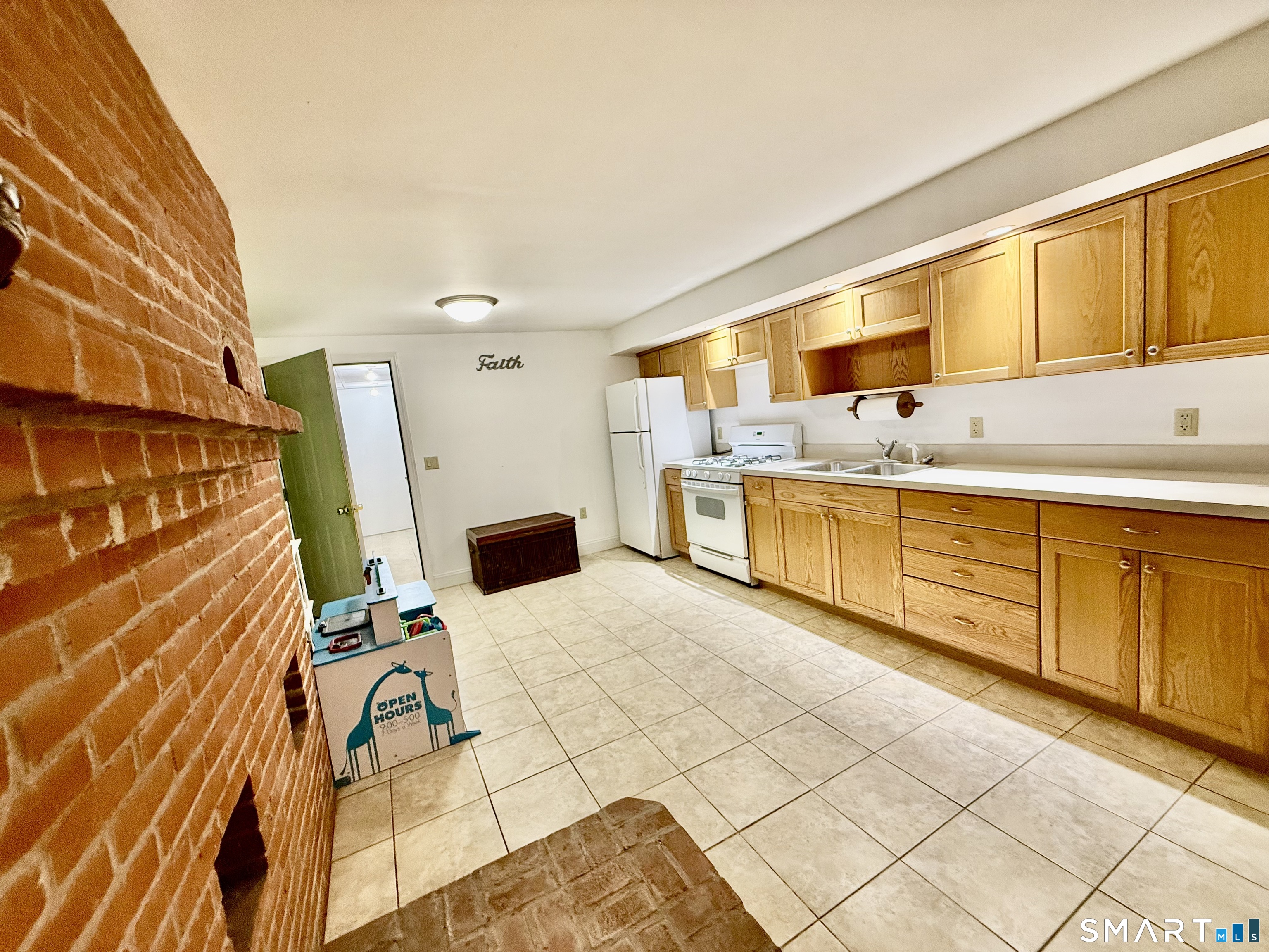 1425 Exeter Road Lebanon, CT 06249 - Photo 23 of 28 a view of a kitchen with furniture and a window