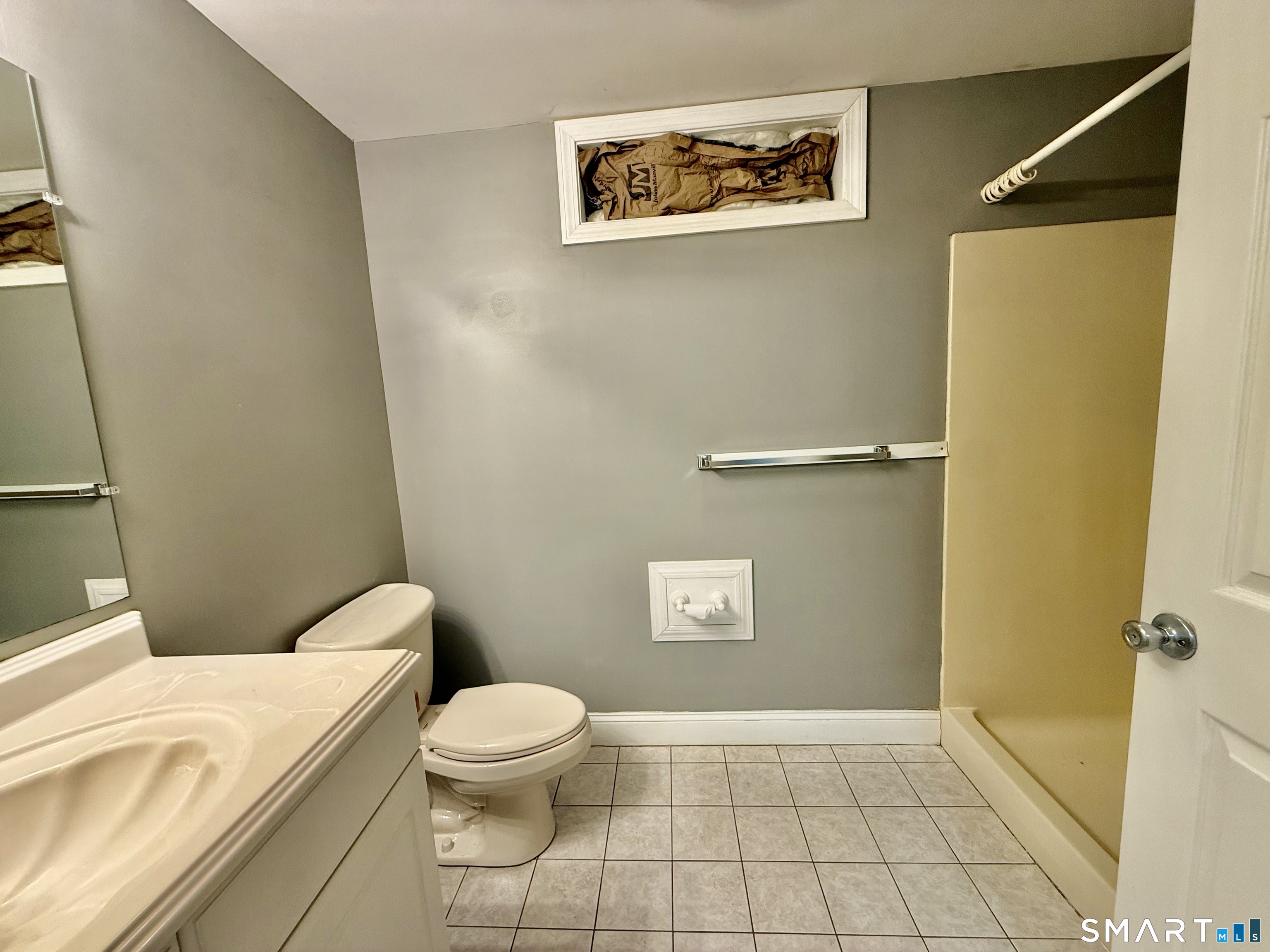 1425 Exeter Road Lebanon, CT 06249 - Photo 25 of 28 a bathroom with a toilet a sink and vanity