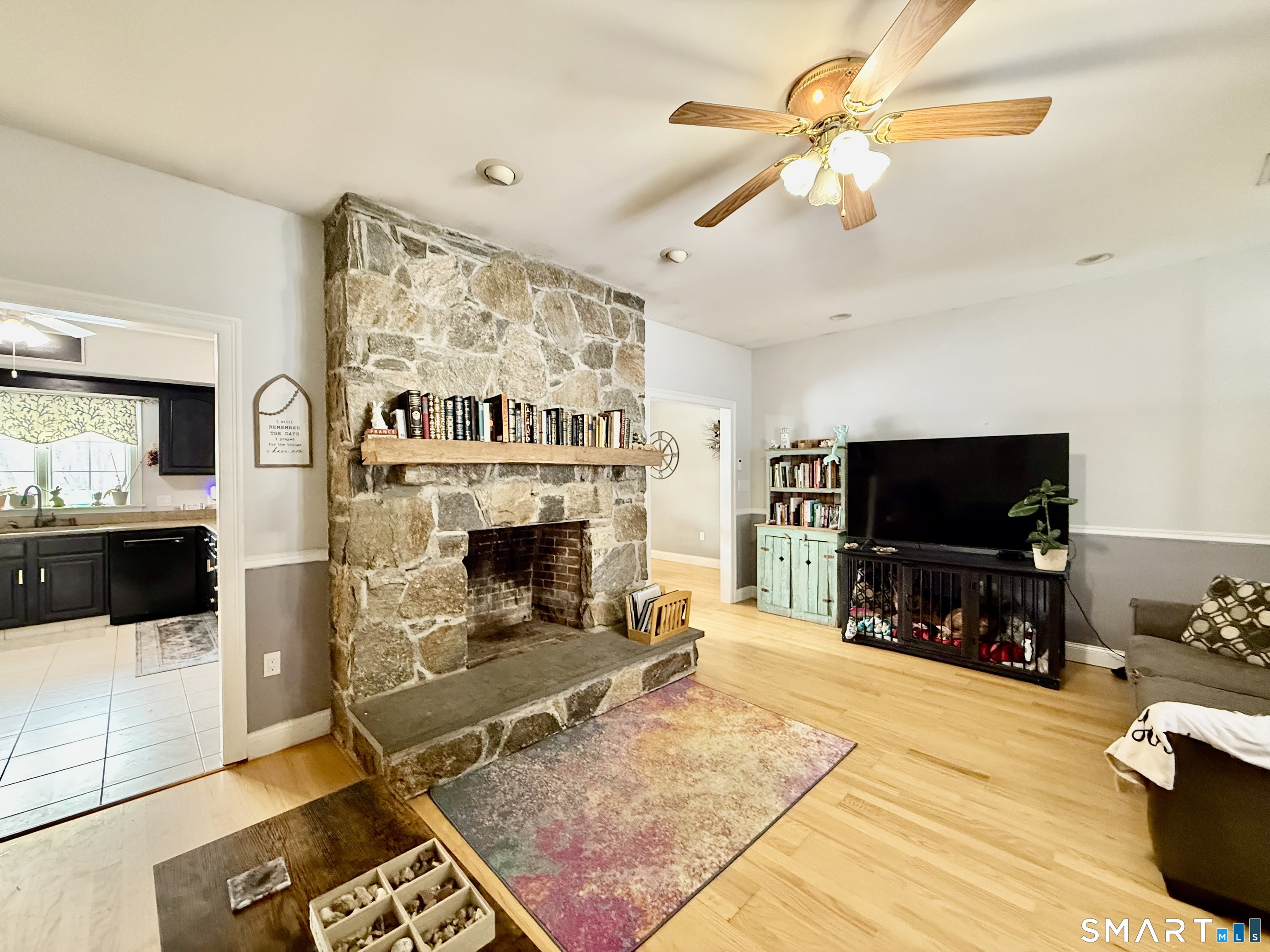 1425 Exeter Road Lebanon, CT 06249 - Photo 28 of 28 a living room with furniture and a flat screen tv