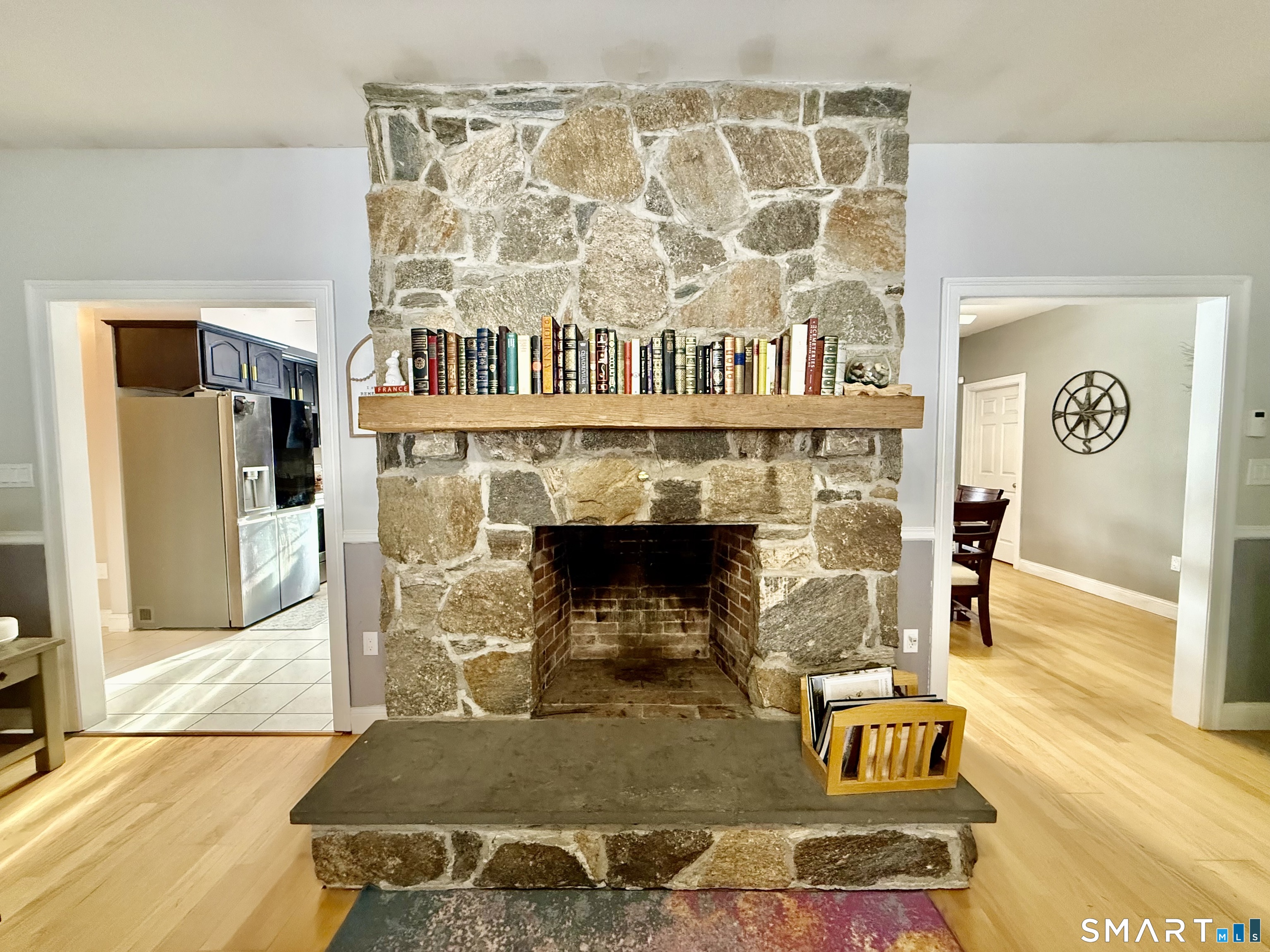 1425 Exeter Road Lebanon, CT 06249 - Photo 8 of 28 a living room with furniture and a fireplace