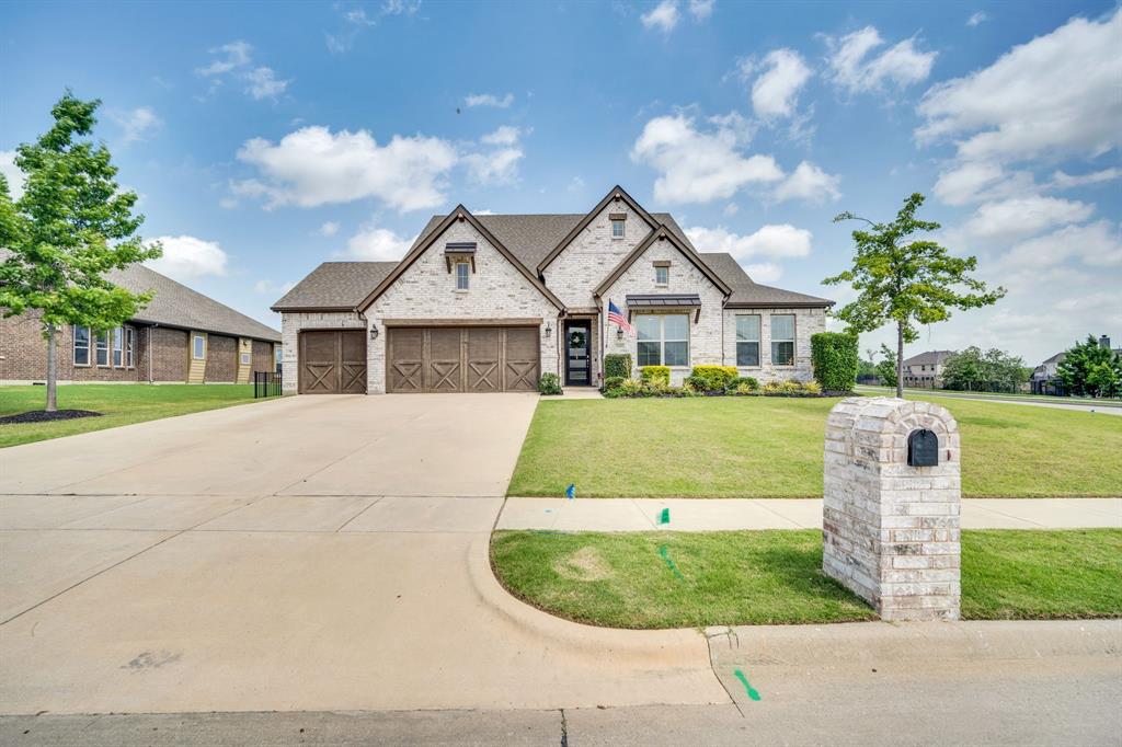 1601 Bear Path Way Gunter, TX 75058 - Photo 36 of 40 a view of a house with a swimming pool and a garden