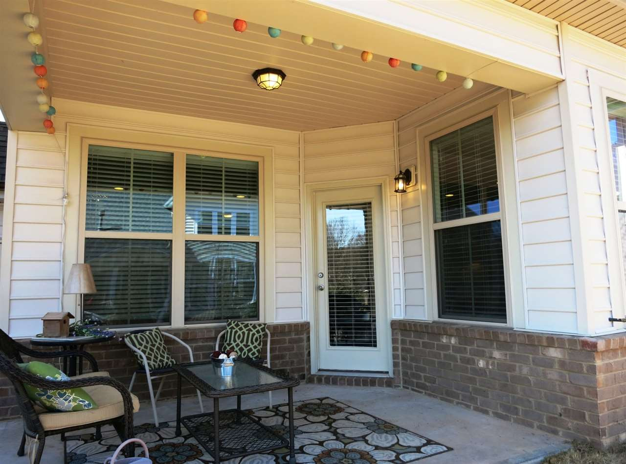 3916 Rock Rose Lane Raleigh, NC 27612 - Photo 21 of 25 The covered Patio off the Family Rm, Kitchen & Dining area overlooks the fenced backyard - great for grilling & entertaining. Covered Patio