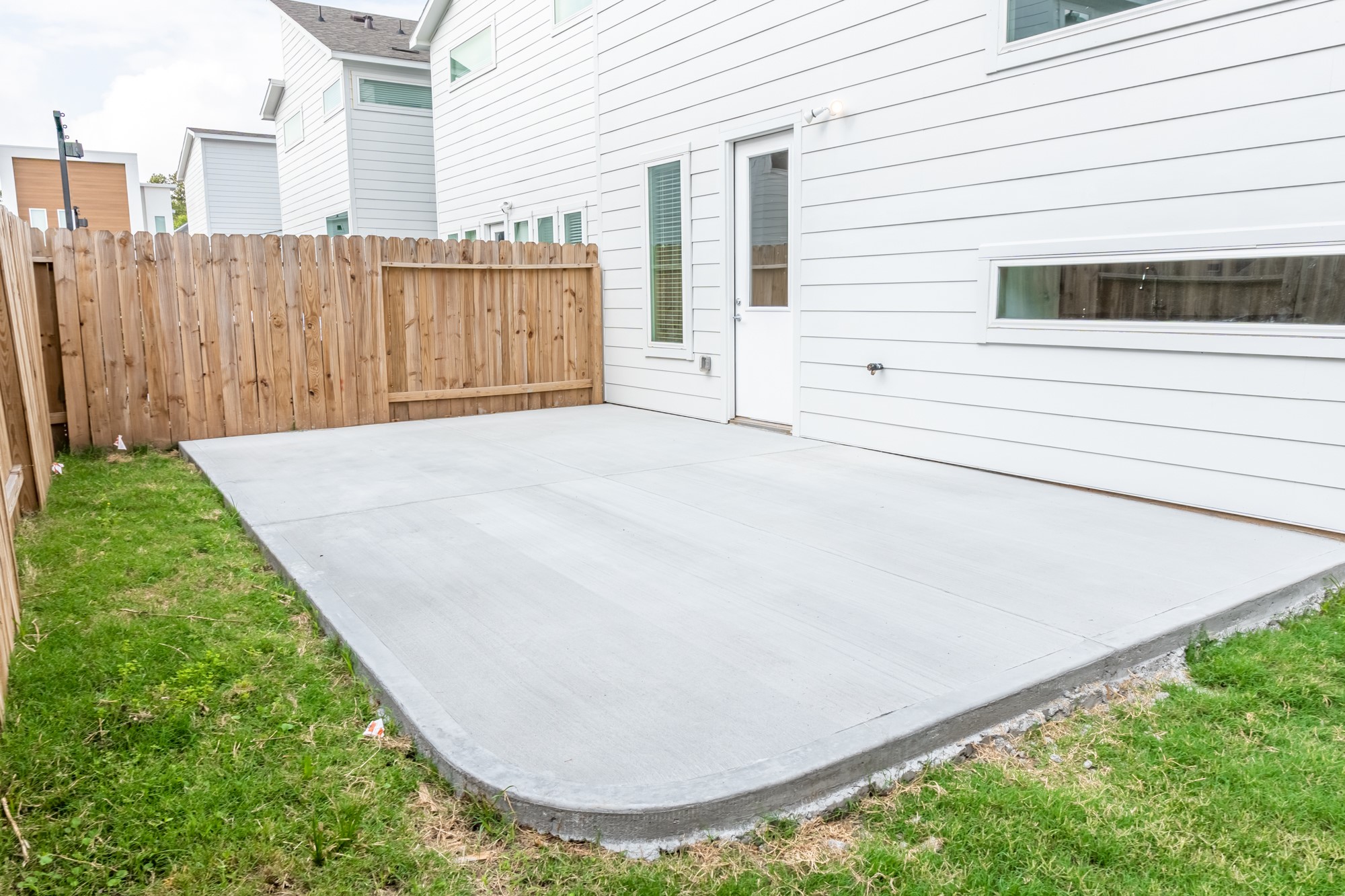 5416 Robusto Place Houston, TX 77091 - Photo 21 of 21 Huge paved backyard to place an outdoor grill with covered patio furniture.