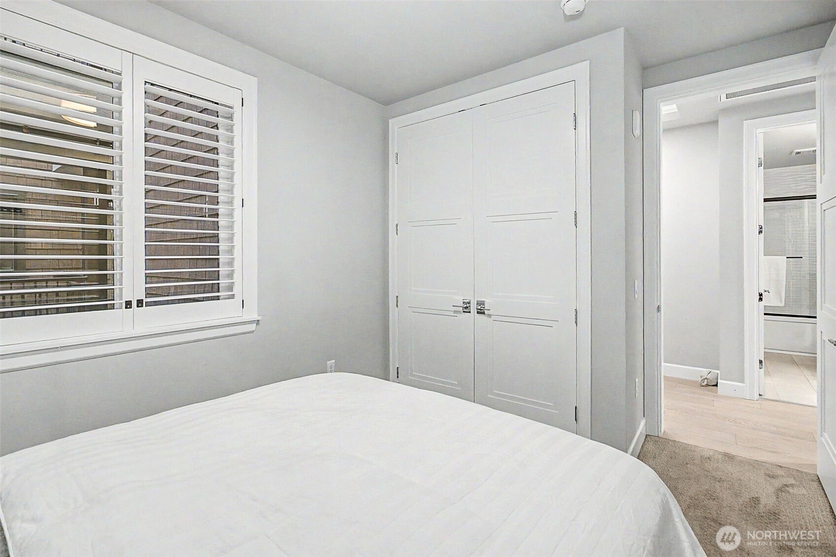 4907 Main Street, Unit 608 Tacoma, WA 98407 - Photo 19 of 40 a bedroom with a bed and a window