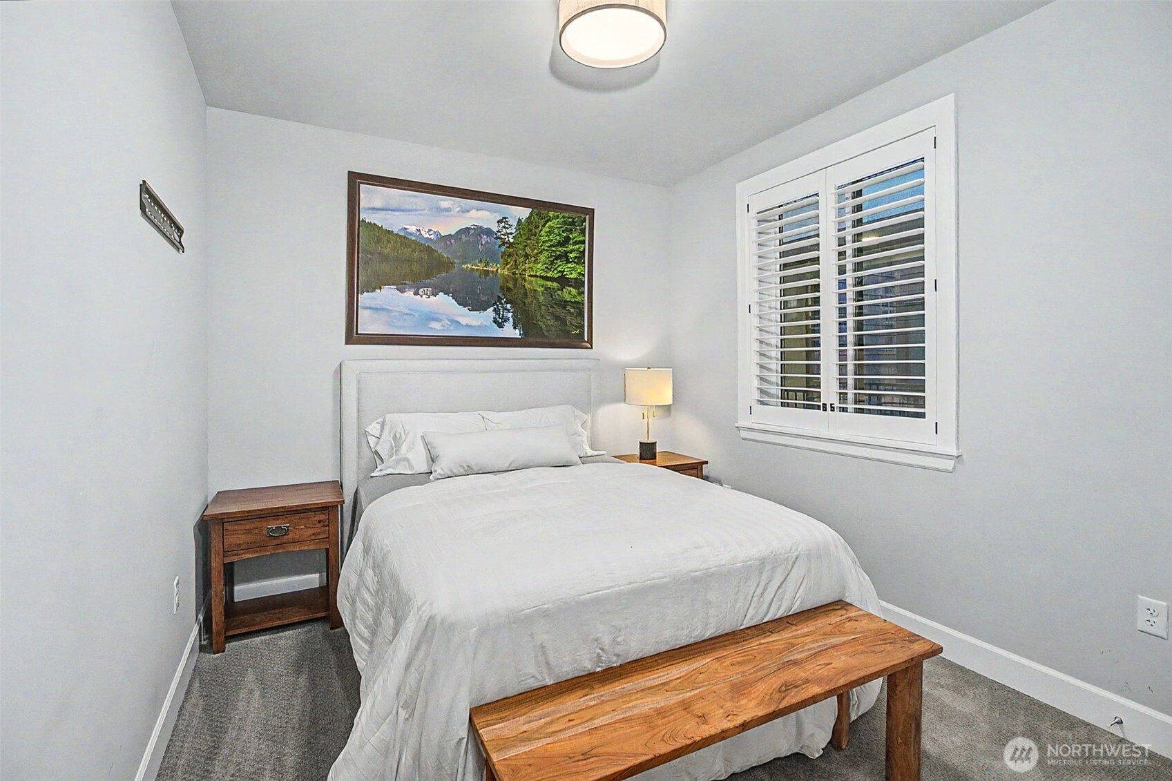 4907 Main Street, Unit 608 Tacoma, WA 98407 - Photo 28 of 40 a bedroom with a bed and a window