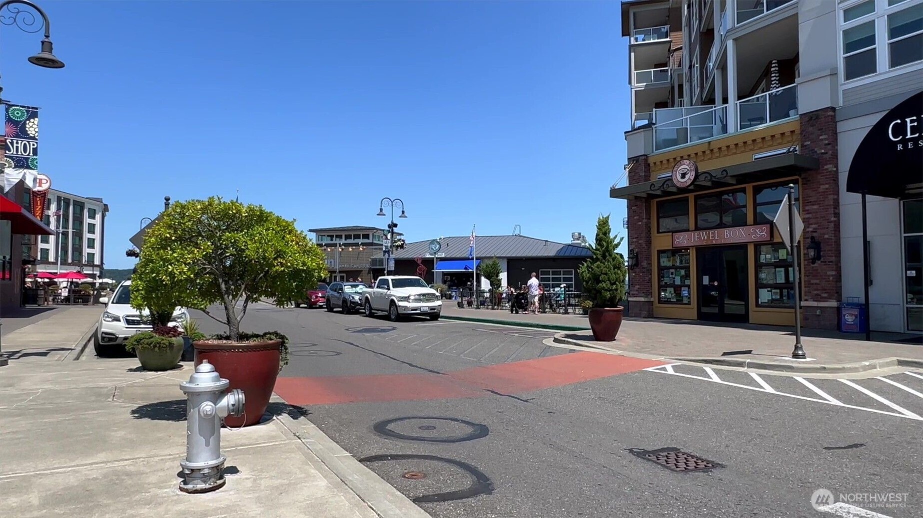 4907 Main Street, Unit 608 Tacoma, WA 98407 - Photo 40 of 40 a street view with building and car parked