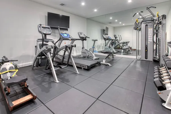 a view of a room with gym equipment