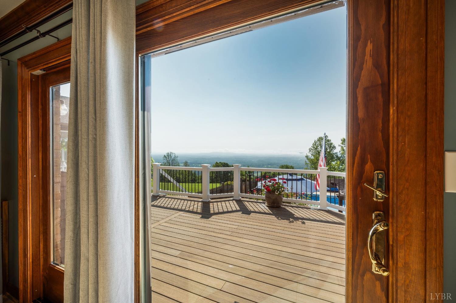 355 Dyson Road Amherst, VA 24521 - Photo 12 of 96 a view of a balcony and chairs