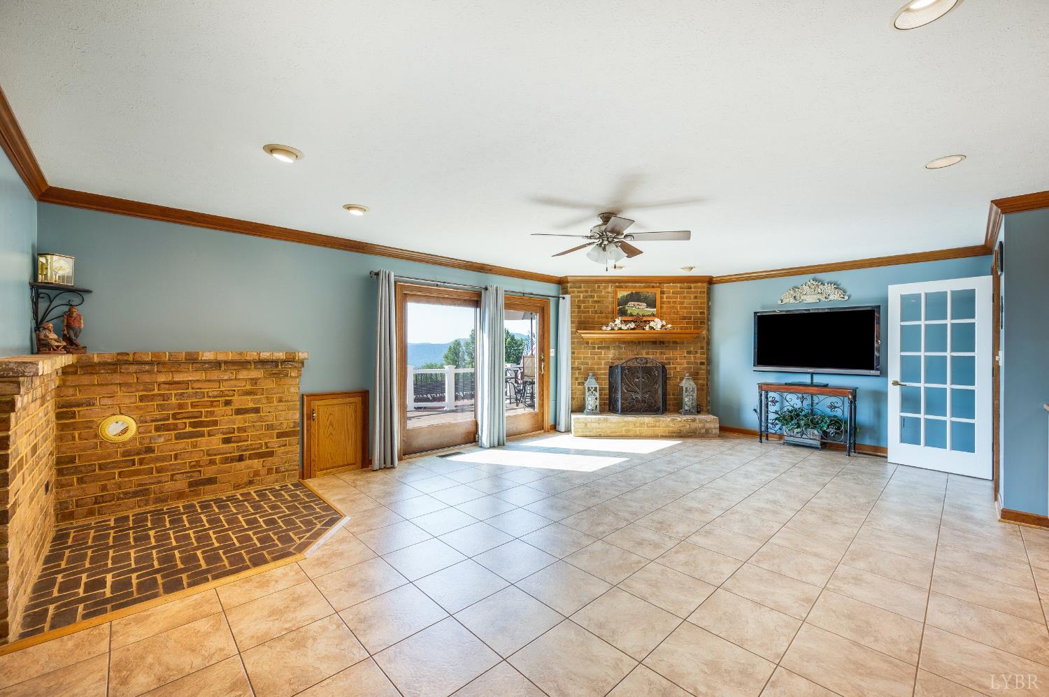 355 Dyson Road Amherst, VA 24521 - Photo 14 of 96 a view of livingroom with workspace and windows