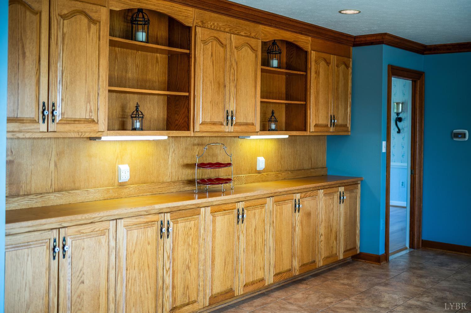 355 Dyson Road Amherst, VA 24521 - Photo 15 of 96 a bathroom with a sink and a large mirror