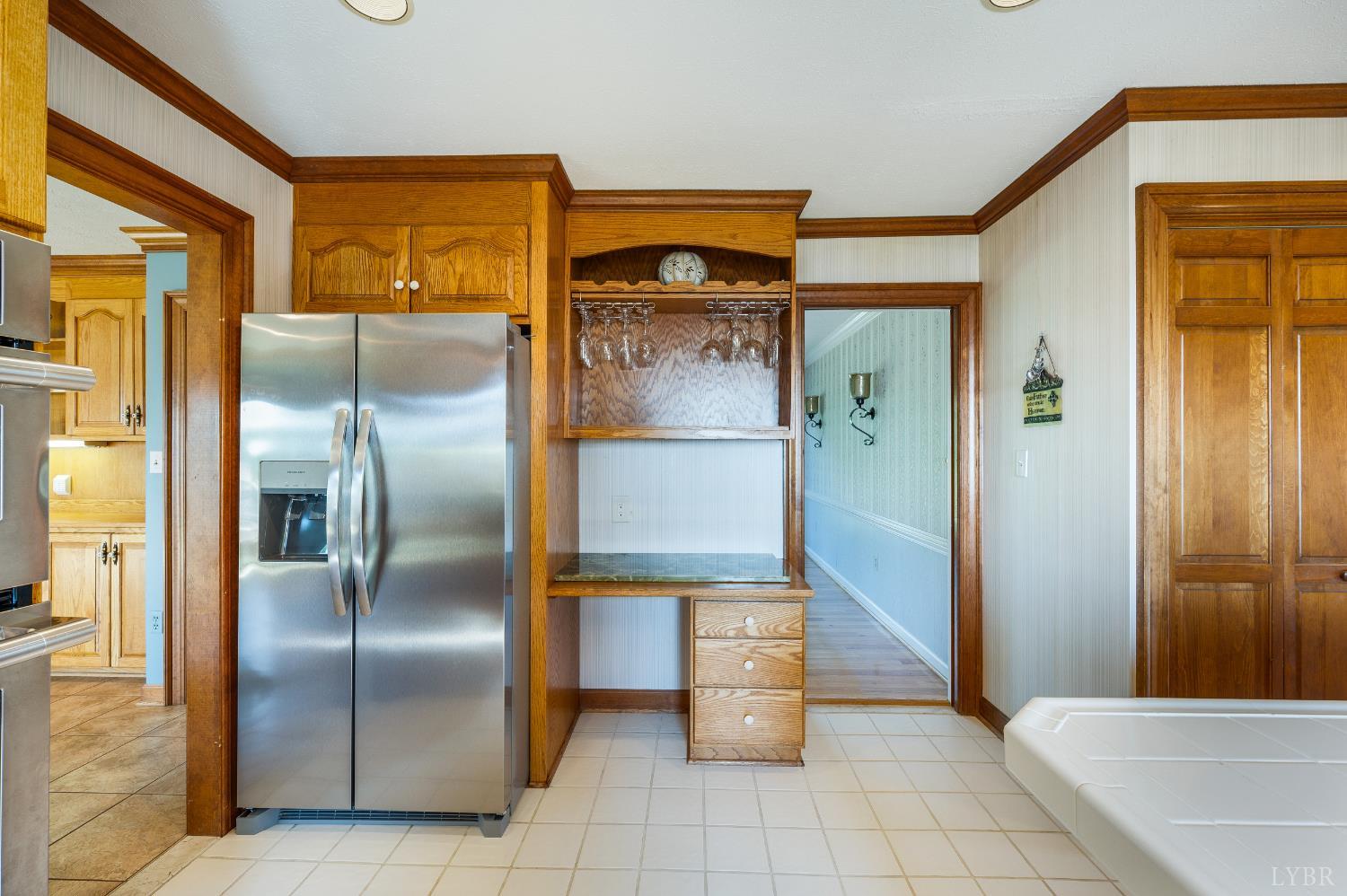 355 Dyson Road Amherst, VA 24521 - Photo 21 of 96 a kitchen with stainless steel appliances granite countertop a refrigerator and a sink