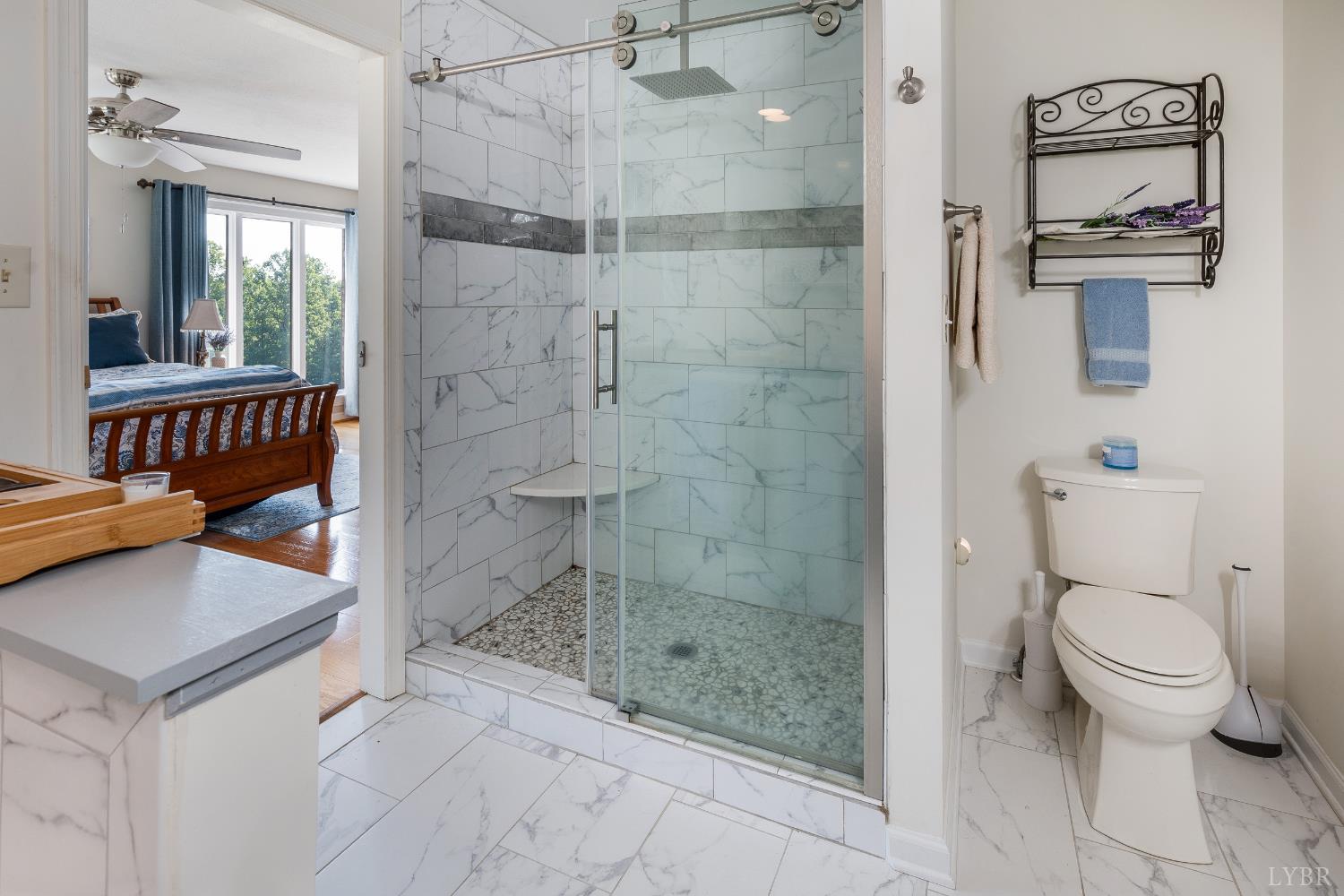 355 Dyson Road Amherst, VA 24521 - Photo 29 of 96 a bathroom with a toilet a sink and shower