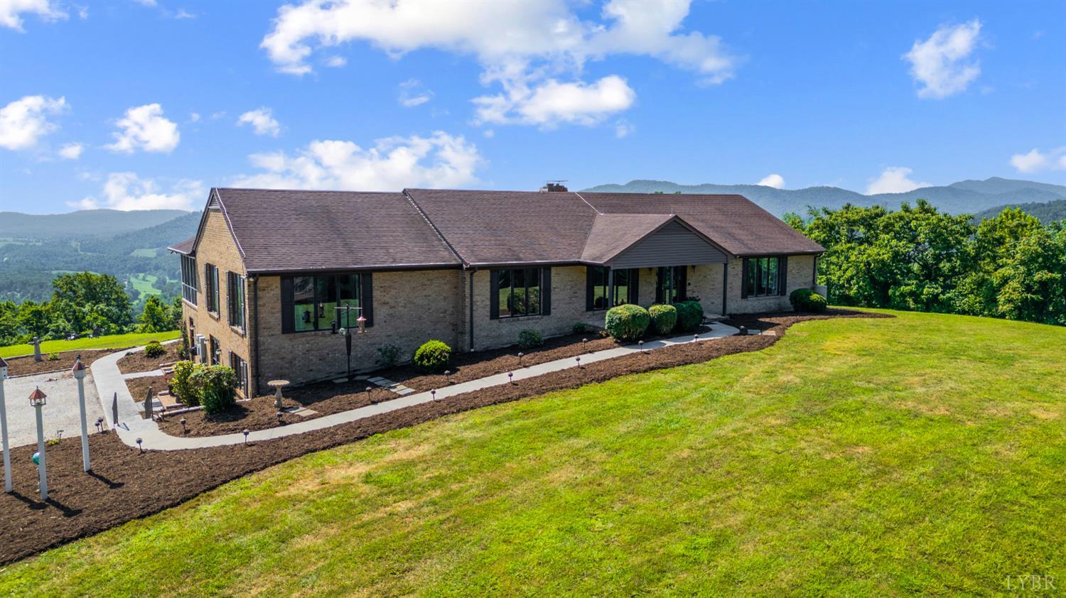 355 Dyson Road Amherst, VA 24521 - Photo 3 of 96 a front view of house with yard and outdoor seating