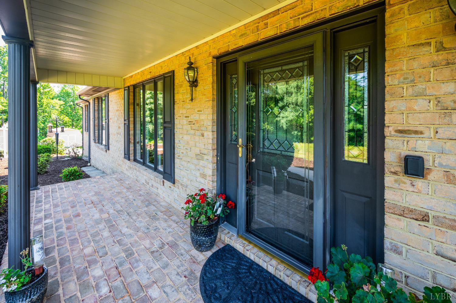 355 Dyson Road Amherst, VA 24521 - Photo 5 of 96 a view of a porch with a potted plant