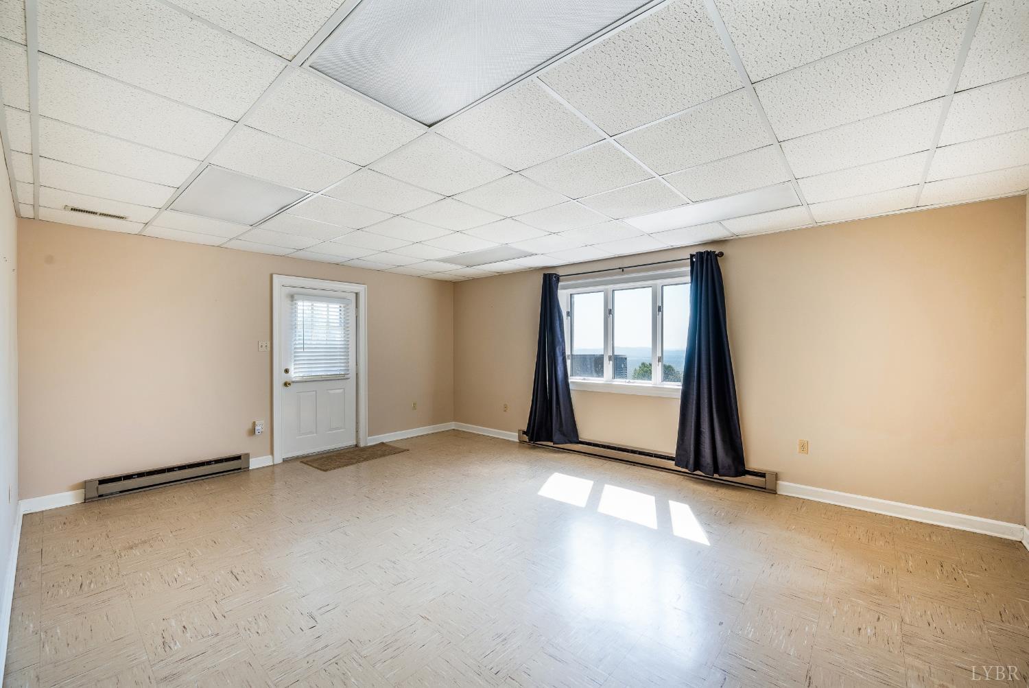 355 Dyson Road Amherst, VA 24521 - Photo 56 of 96 Home Office or Guest Room with Exterior Entrance adjacent to Rec Room