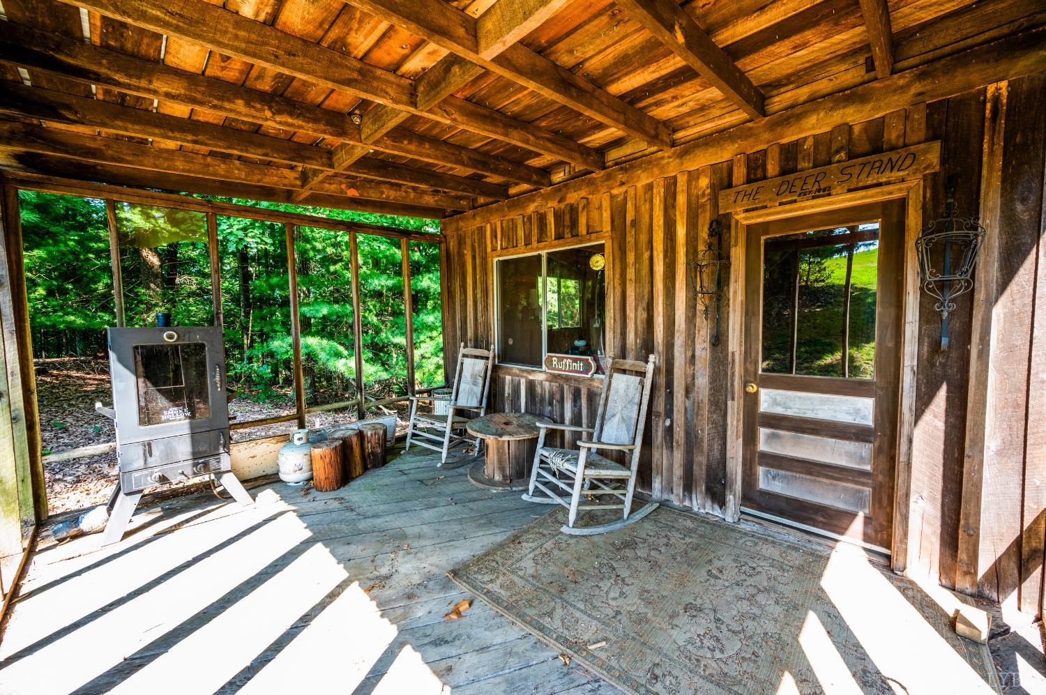 355 Dyson Road Amherst, VA 24521 - Photo 78 of 96 a view of a porch with furniture and a backyard