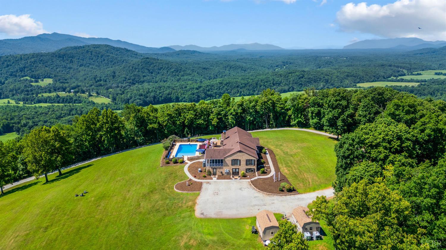 355 Dyson Road Amherst, VA 24521 - Photo 89 of 96 a view of a swimming pool with a yard