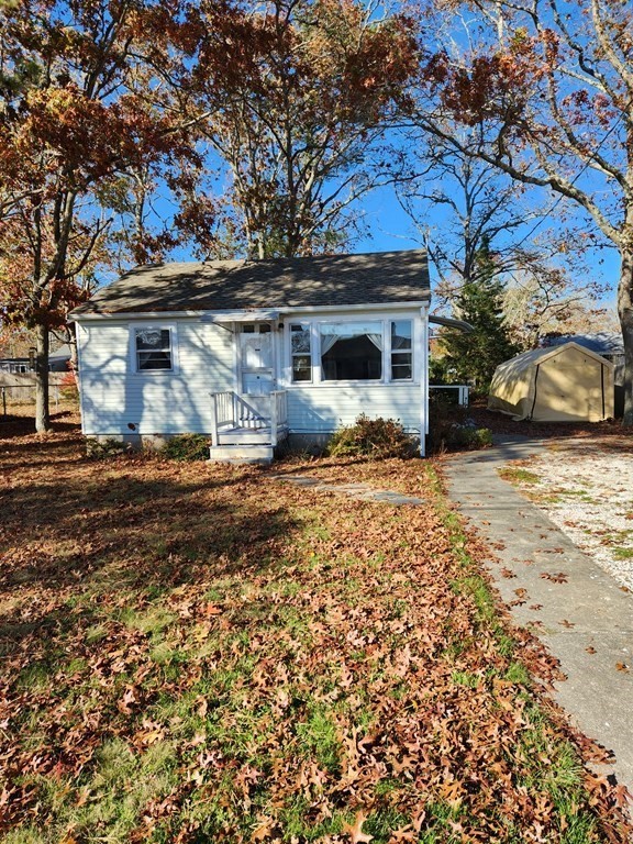 67 Ryder Street Buzzards Bay, MA 02532 - Photo 2 of 14 a view of a house with a yard