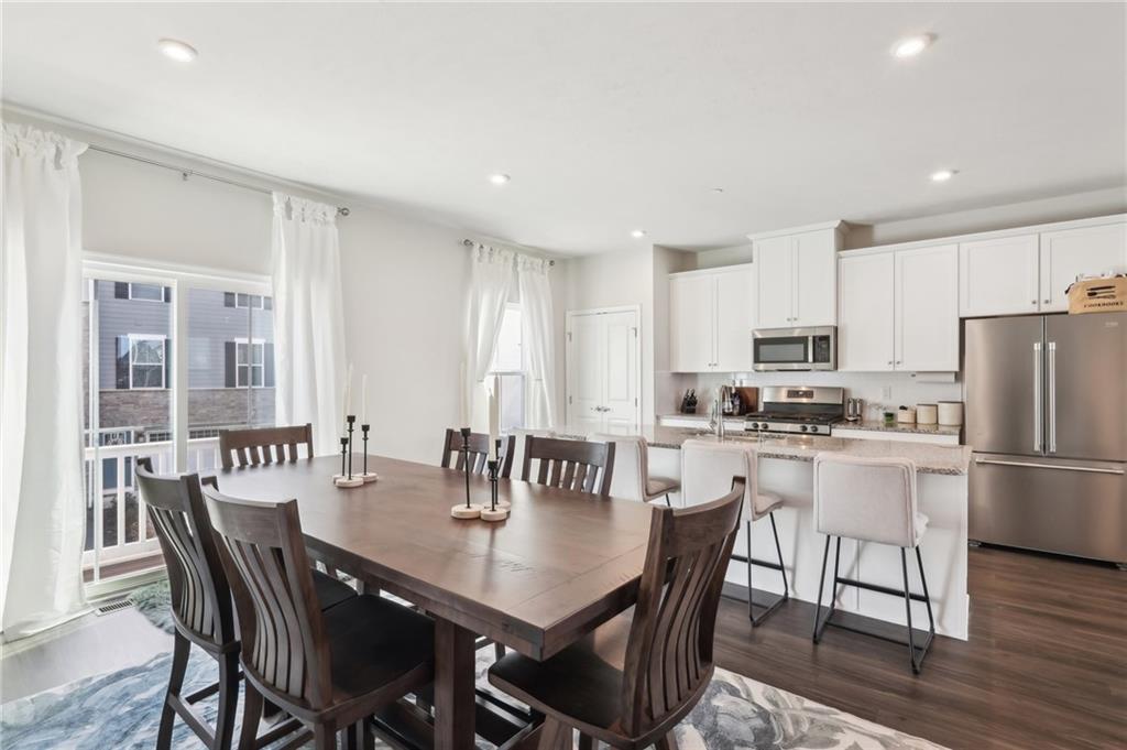 4300 Spruce Road Gibsonia, PA 15044 - Photo 18 of 48 a view of kitchen with refrigerator dining table and chairs