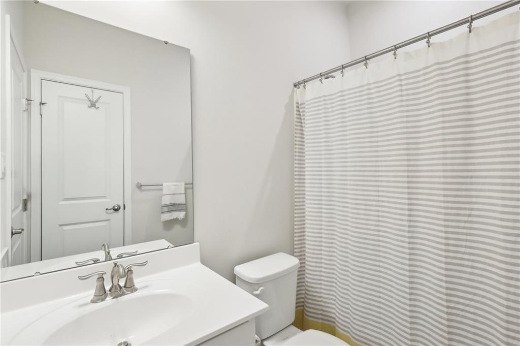 4300 Spruce Road Gibsonia, PA 15044 - Photo 32 of 48 a bathroom with a sink a toilet and mirror