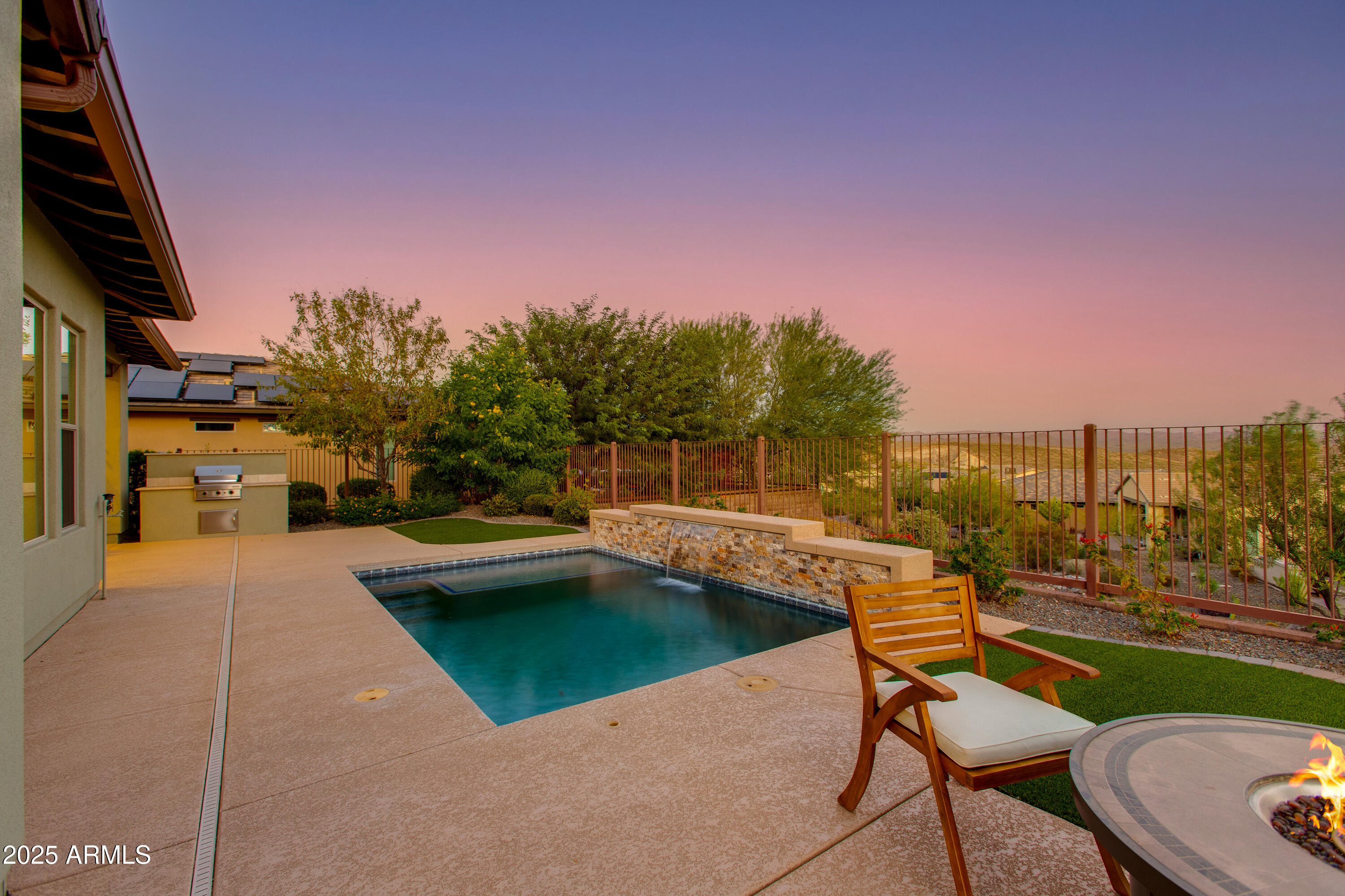 3675 Gold Ridge Road Wickenburg, AZ 85390 - Photo 48 of 66 a view of a swimming pool with lounge chairs